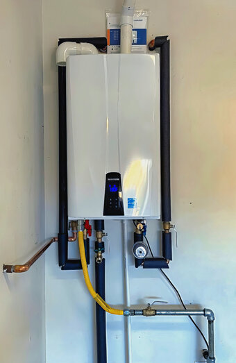 https://maddingtonhotwater.com.au/uploads/2025/06/instant-hot-water-systems-63860.jpg
